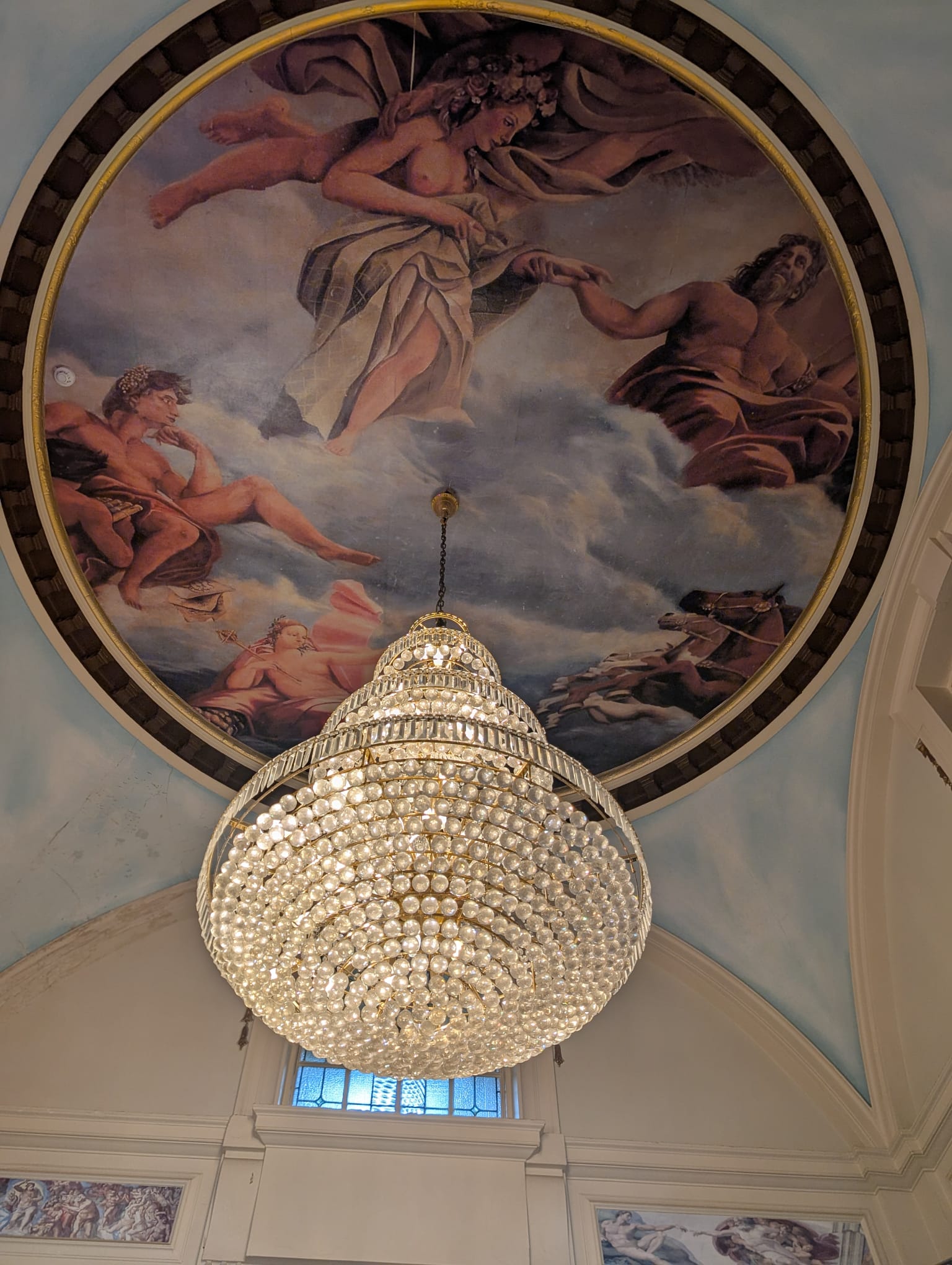 Ornate Victorian ceiling fresco and chandelier inside The Royal Hotel, Skegness