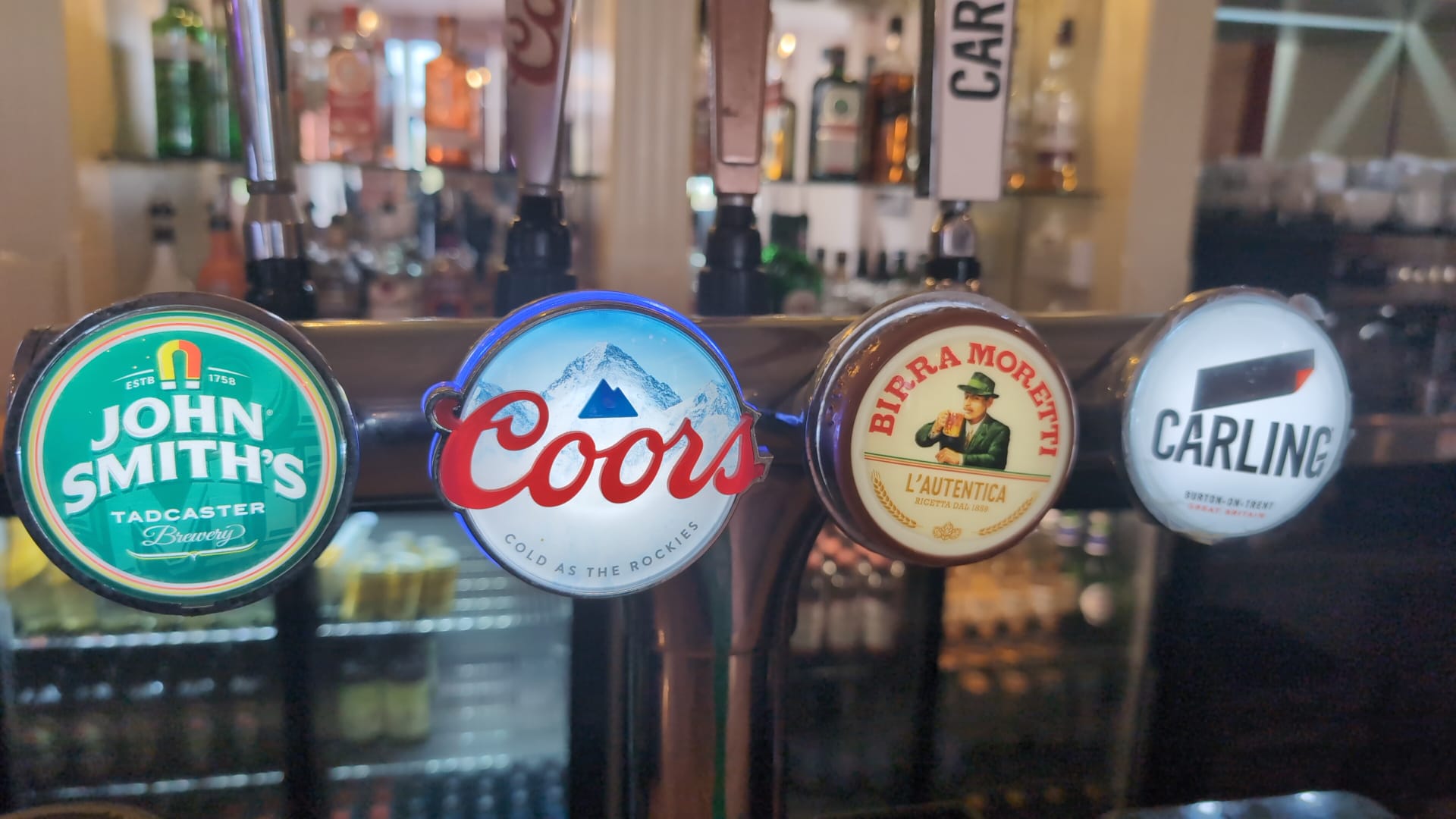 Draught beer taps at the bar