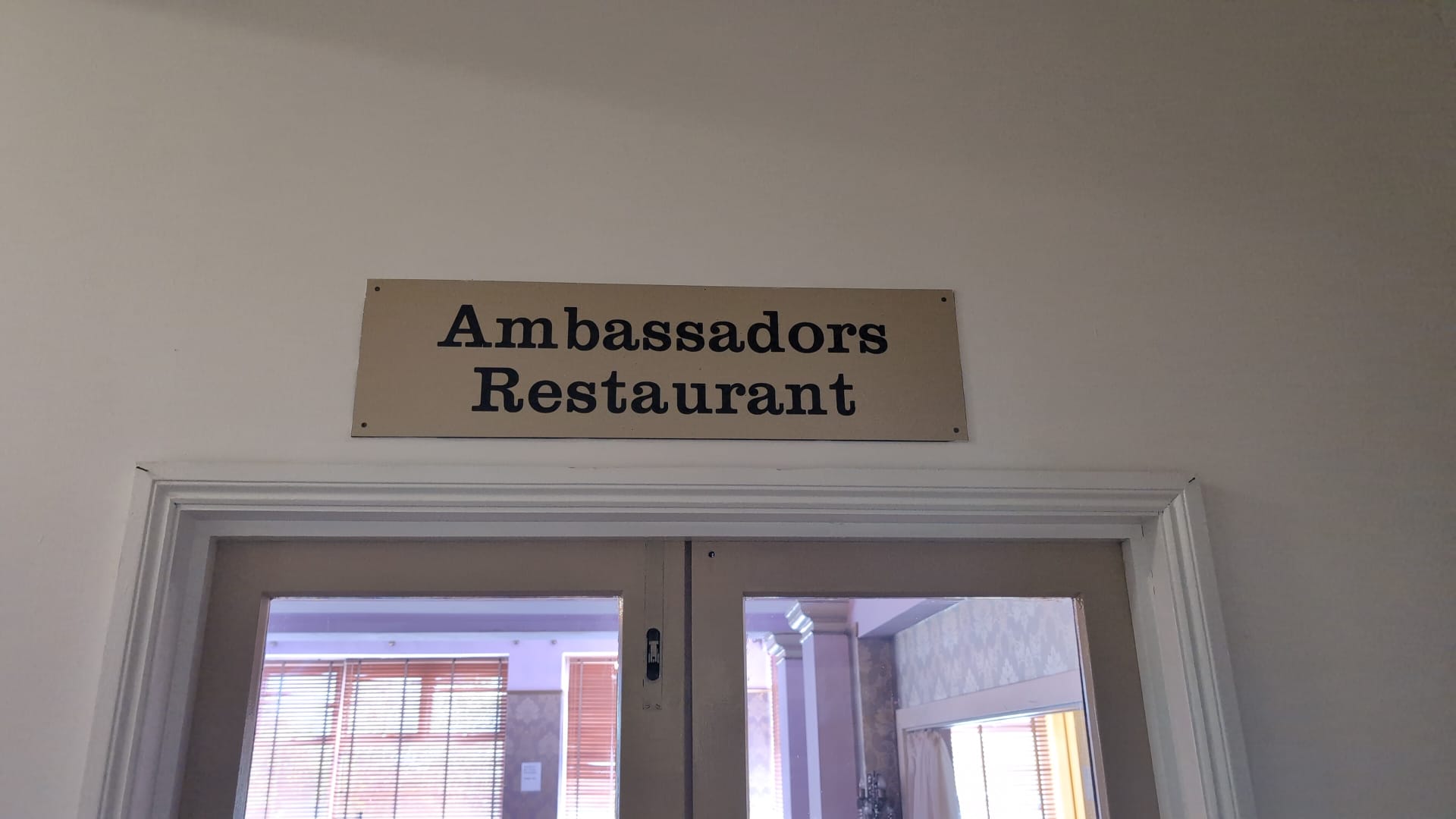 Sign for Ambassadors restaurant