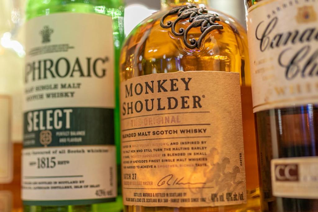 Whisky bottles on the back-bar shelf