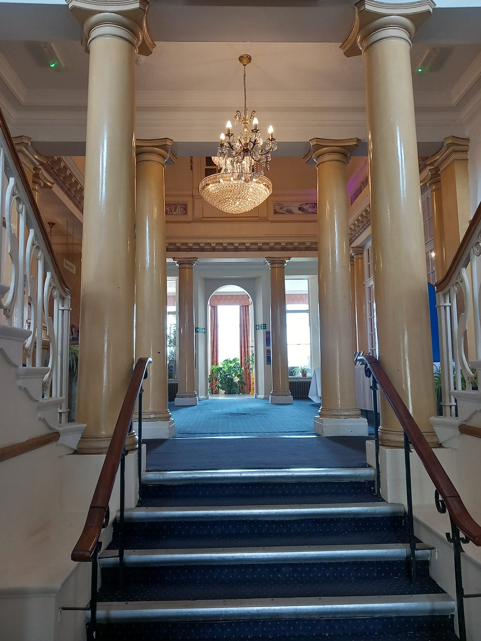 Entrance foyer with patterned tiled floor