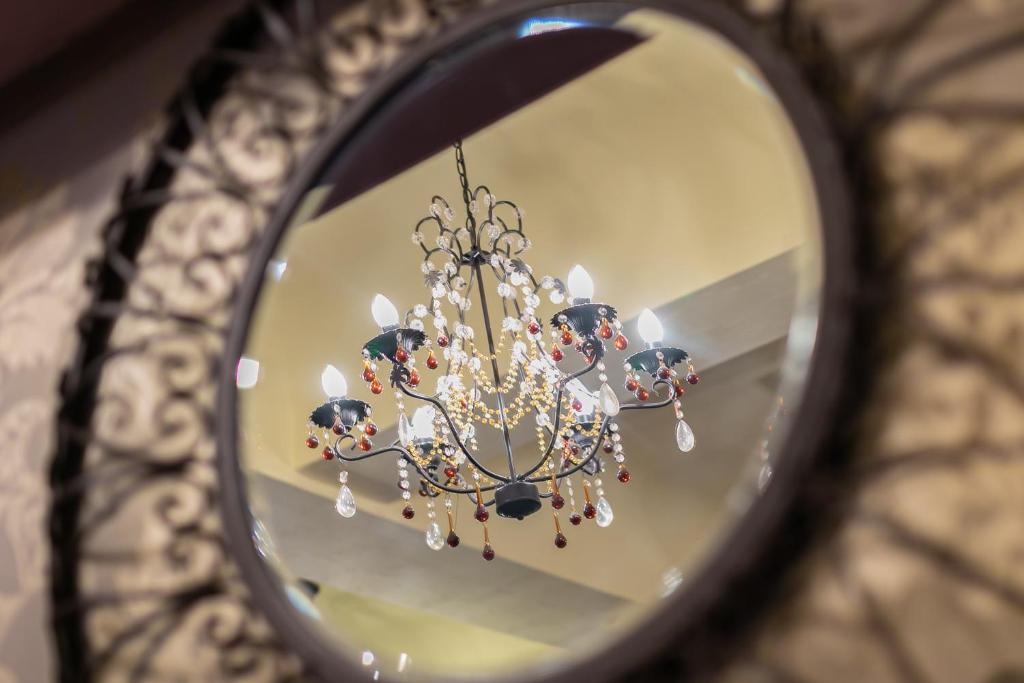 Chandelier reflected in ornate mirror - The Royal Hotel, Skegness