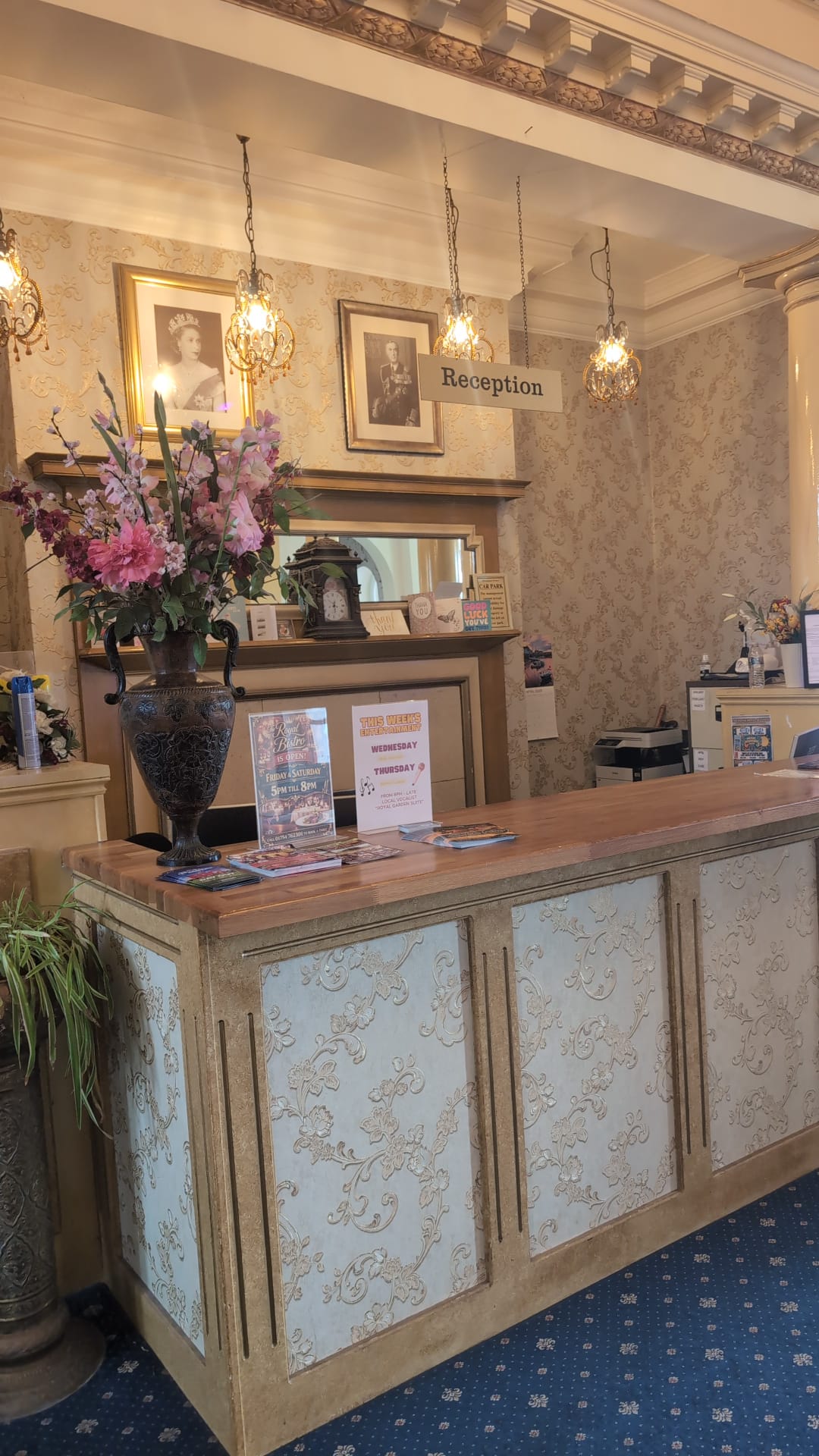 Reception desk and surrounding lobby, wide angle
