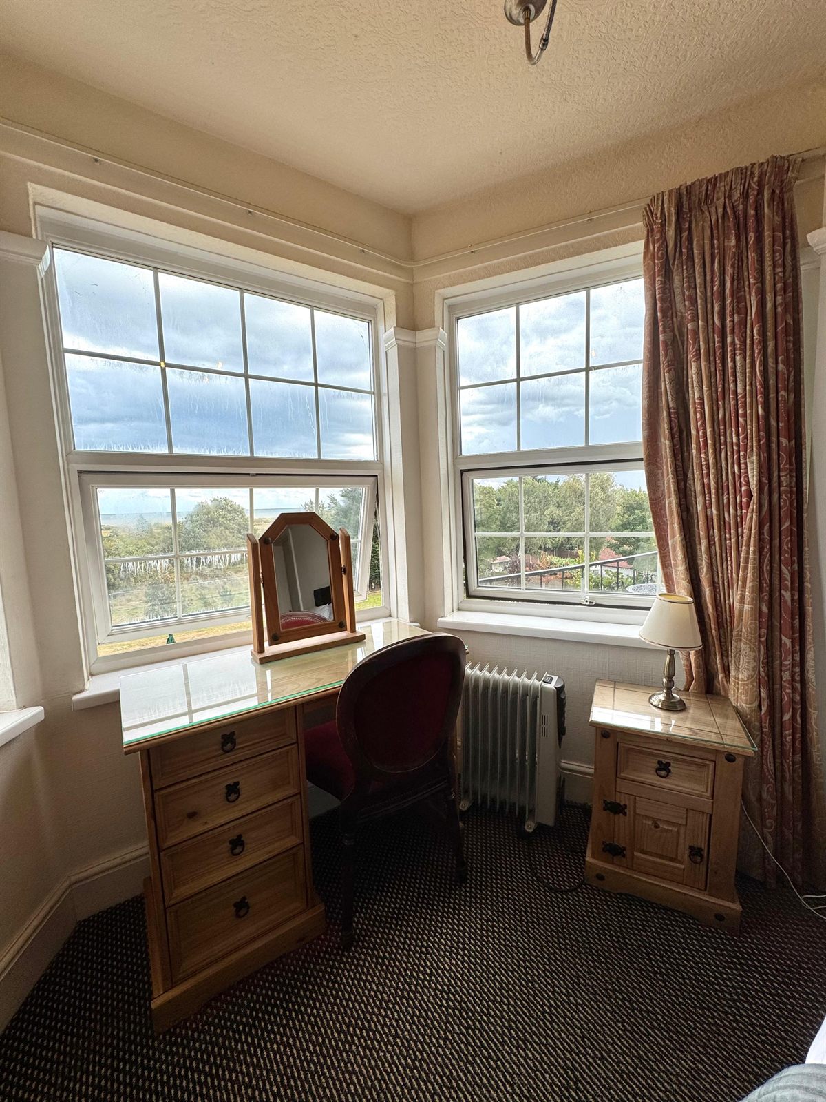 Dressing table beneath the bay window