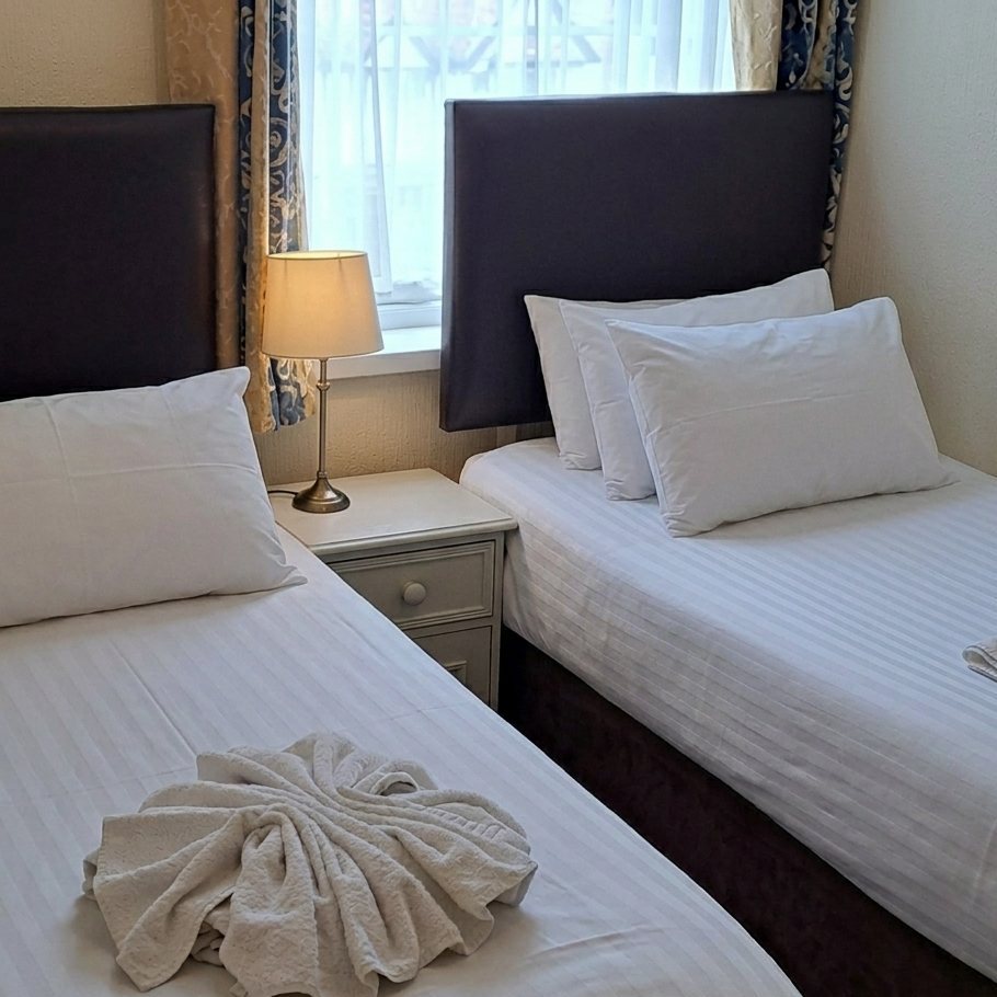 Standard Twin Seaview guest room at The Royal Hotel